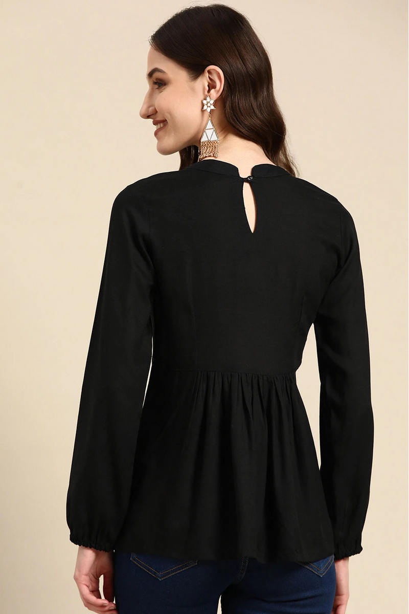Back view long sleeve black top
