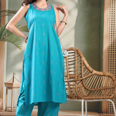 Female ethnic turquoise kurta set front view
