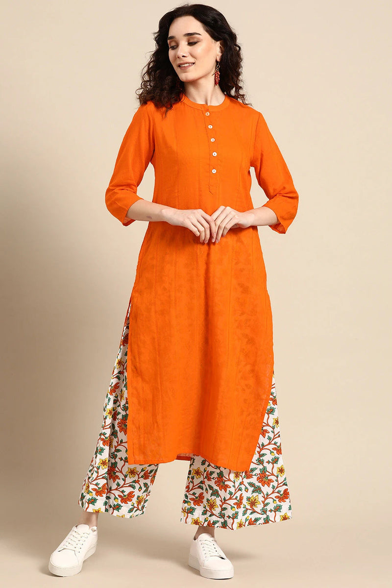 Front view orange cotton kurta set women

