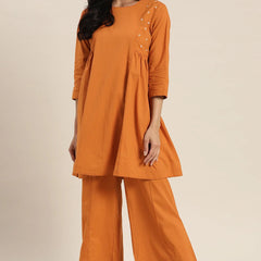 Front view rust cotton kurta set women
