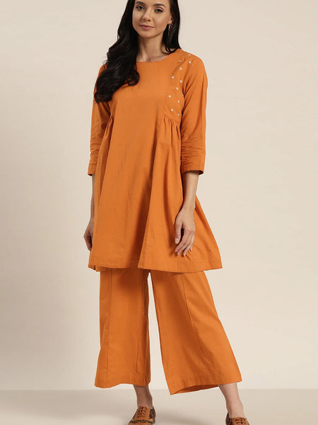 Front view rust cotton kurta set women
